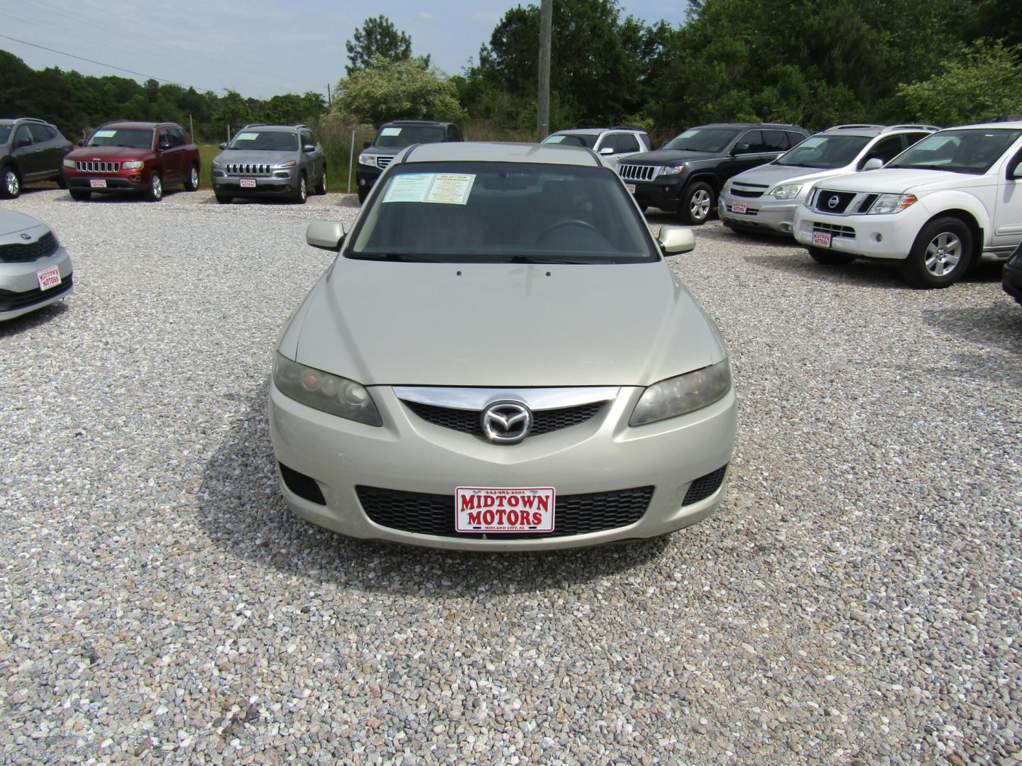 2006 Gold /Tan Mazda MAZDA6 i Sports Sedan (1YVFP80C465) with an 2.3L L4 DOHC 16V engine, Automatic transmission, located at 15016 S Hwy 231, Midland City, AL, 36350, (334) 983-3001, 31.306210, -85.495277 - Photo#1